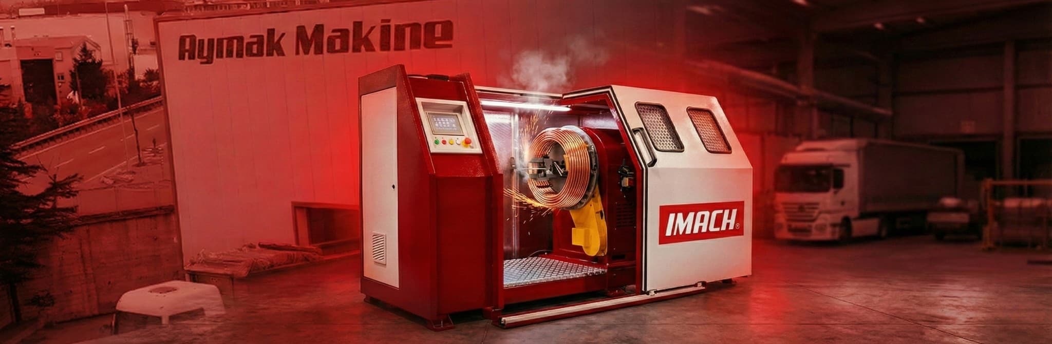 Aymak Makine industrial machine - IMACH branded red and white payoff/takeup system in operation